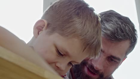 Boy-Putting-Screws-into-Furniture