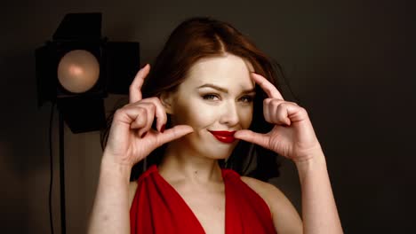 Beautiful-girl-photographer-in-red-dress.