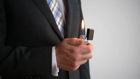 Cinemagraph-of-closeup-of-businessman-with-a-lighter-in-his-hands