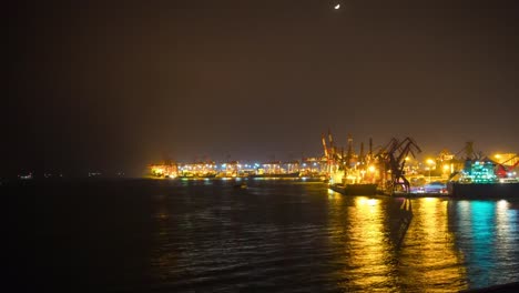 night-illuminated-shenzhen-city-working-port-industrial-bay-cranes-panorama-4k-time-lapse-china