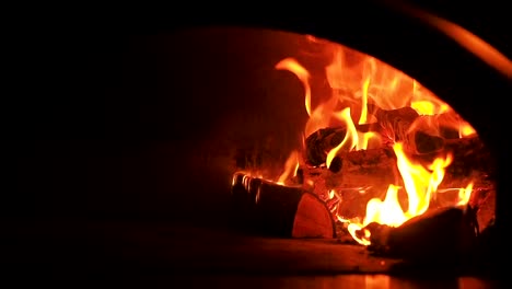 Furnace-fire.-Video-clip-of-burning-firewood-in-the-fireplace.-Firewood-burn-in-the-oven.-30fps-Full-HD-Zoom