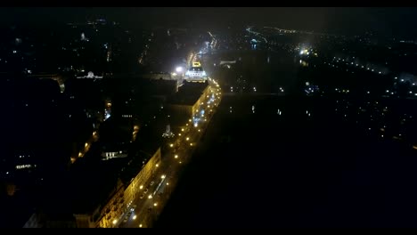 Night-panorama-of-Prague,-panoramic-view-from-the-air-to-the-old-town,-lights-of-the-night-city,-Prague