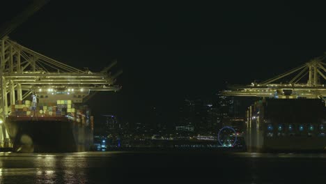 Seattle-Harbor-Island-Shipping-Terminal-Cargo-Ship-Freighters-Loading-and-Unloading-Shipping-Containers-Along-Duwamish-Waterway-at-Night