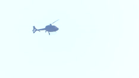 The-helicopter-is-flying-in-the-sky.