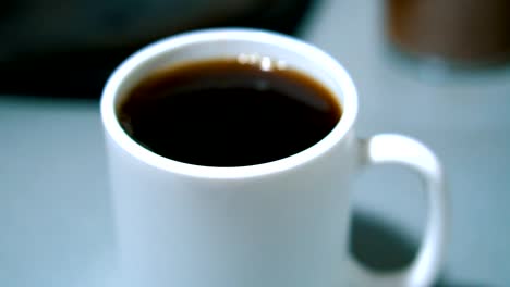 Prepare-a-cup-of-instant-coffee.-Dilute-with-cold-water.