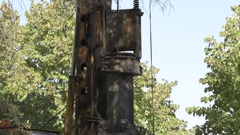 Construction-drill-auger-working-in-the-countryside