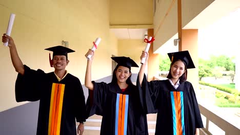 Black-graduates-wear-black-suits-on-graduation-day-at-university.