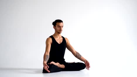 Man-meditating-in-lotus-position