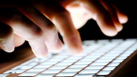 Close-up-of-a-hand-typing-on-the-technological,-futuristic-and-holographic-keyboard.