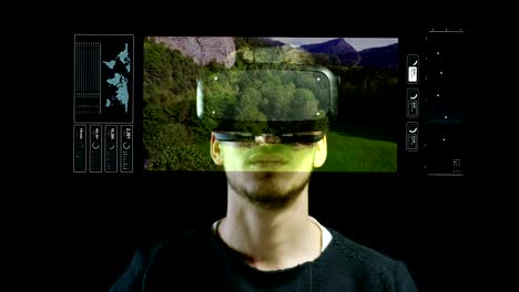 young-nice-man-using-3d-reality-in-life-with-oculus-and-augmented-reality-technology-with-implements-of-reality.