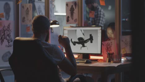 Man-modeling-an-airplane-on-computer