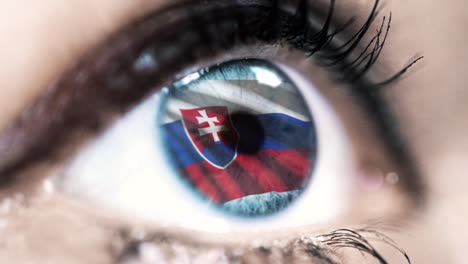 woman-blue-eye-in-close-up-with-the-flag-of-slovakia-in-iris-with-wind-motion.-video-concept
