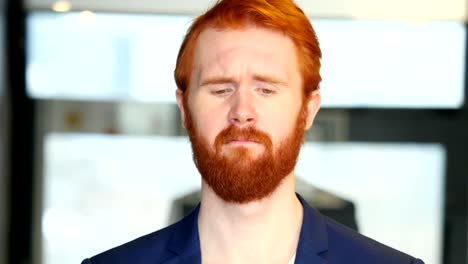 Sad-Businessman-with-Red-Hair,-Beard