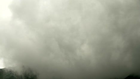 Time-lapse-thunder-storm-clouds-near-Grauspitze-Lichtenstein-minimalistic-moody-nature-landscape-background