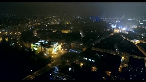 Night-panorama-of-Prague,-panoramic-view-from-the-air-to-the-old-town,-lights-of-the-night-city,-Prague