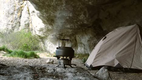 Kettle-is-heated-on-the-gas-burner-at-the-campsite