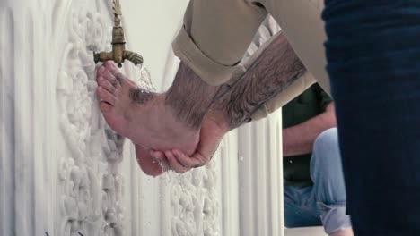 Slow-motion-footage.-Washing-of-the-Feet-before-prayer