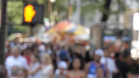 Anonymous-crowd-of-people-walking-at-city-crosswalk-NYC