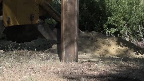 Construction-drill-auger-working-in-the-countryside