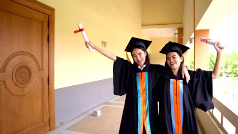 Black-graduates-wear-black-suits-on-graduation-day-at-university.