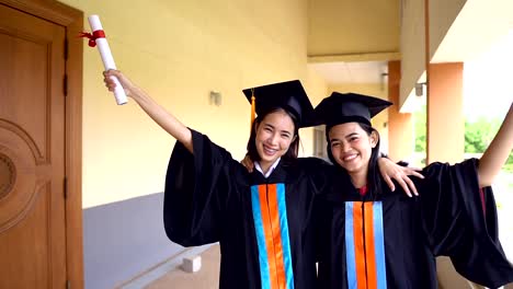 Black-graduates-wear-black-suits-on-graduation-day-at-university.