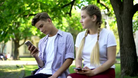 Teenagers-using-phone-instead-of-interacting,-lack-of-communication,-addicted