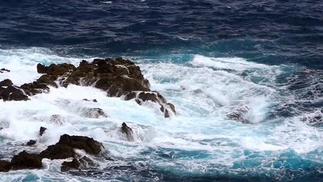 Detail-of-rocks-and-waves.Slow-motion.