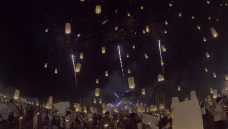 Floating-lanterns-and-fireworks-Yee-Peng-Festival,-Loy-Kra-thong-in-Chiang-mai,-Thailand