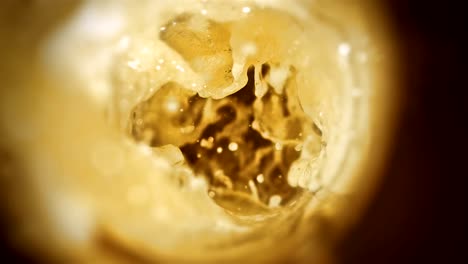 Closeup-slow-motion-pouring-beer-in-glass