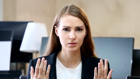 Portrait-of-Angry-Woman-in-Office