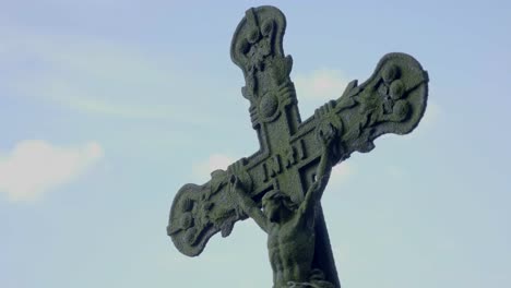 Metal-cross-with-crucified-Christ-and-inscription-INRI.-Christian-symbol-of-faith.
