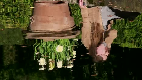 sad-woman-portrait-in-reflection-on-water