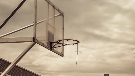 Warm-color-of-basketball-ring-with-timelapse-cloudy-background