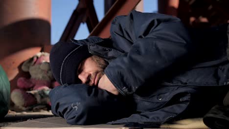 Close-up-portrait-of-homeless-senior-male-sleeping