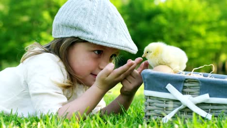 Little-Girl-Playing-with-Chick