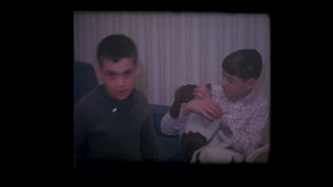 Jewish-boy-wearing-yarmulke,-little-brother-and-their-pet-dog