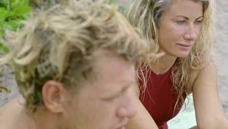 Family-Chatting-on-Tropical-Beach