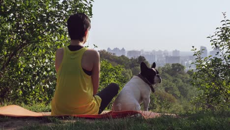 Female-with-pet-enjoy-nature-and-urban-landscape