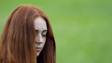 Red-haired-woman-raises-head-up-feels-oneness-unity-with-existence,-deep-relax