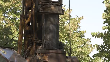 Construction-drill-auger-working-in-the-countryside