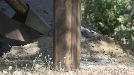 Construction-drill-auger-working-in-the-countryside