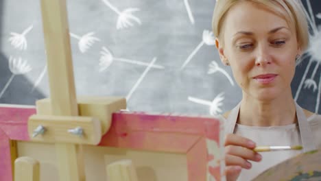 Woman-Painting-in-Art-Studio