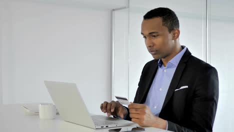 Successful-Online-Shopping-with-Credit-Card,-Payment-by-Casual-Afro-American-Businessman