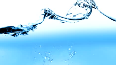 blue-wave-water-with-bubbles-in-tank-on-white-background,-slow-motion-movement,-concept-of-clean-and-purity,-healthcare