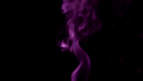 Purple-Steam-Rises-from-up.-Blue-smoke-over-a-black-background.-Smoke-slowly-floating-through-space-against-black-background.-Slow-Motion.