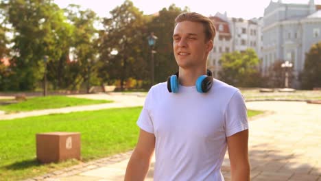 portrait-attractive-young-man-walks-outdoor