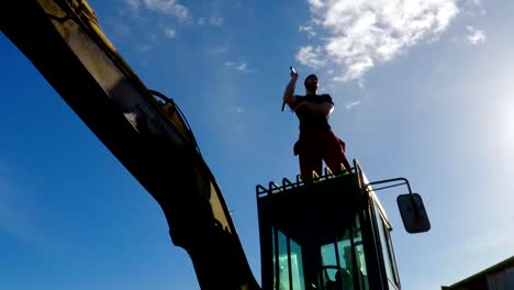 Martial-Art-Nunchaku-training-on-a-backhoe-FDV