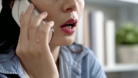 asian-woman-talking-on-cellphone