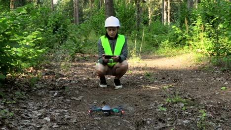 Woman-Worker-take-off-Drone-Quadcopter