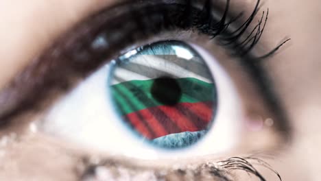 woman-blue-eye-in-close-up-with-the-flag-of-Bulgaria-in-iris-with-wind-motion.-video-concept